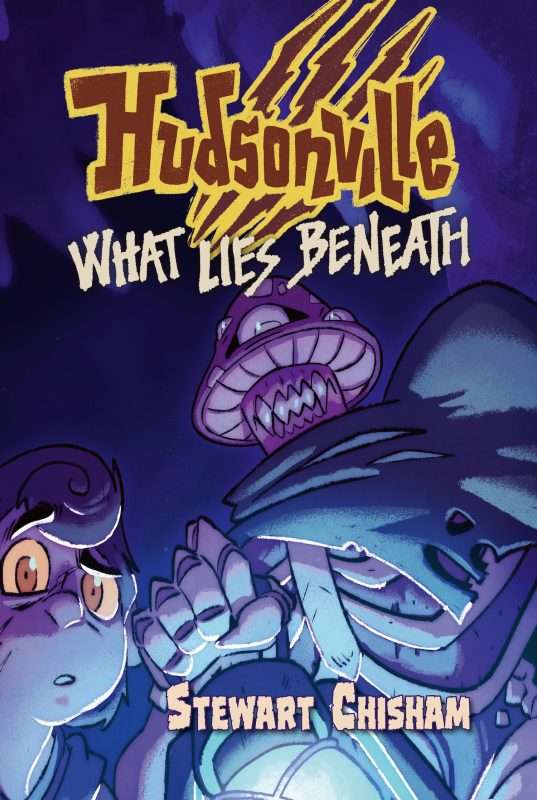 book cover image of Hudsonville - What Lies Beneath showing a character and a robot as cartoon characters looking at the camera in a darkened cave.